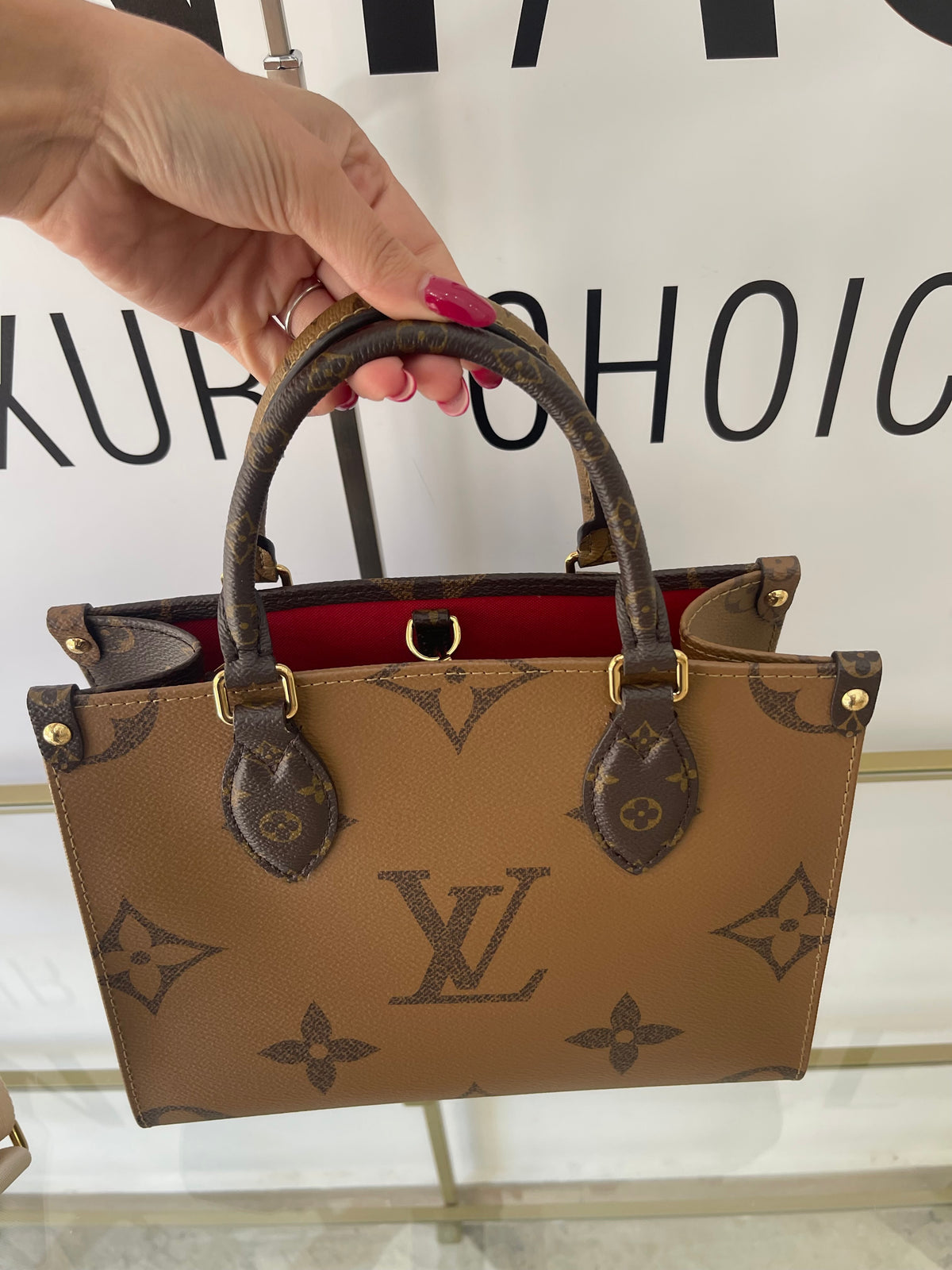 Borsa OnTheGo PM Monogram Reverse Giant Louis Vuitton