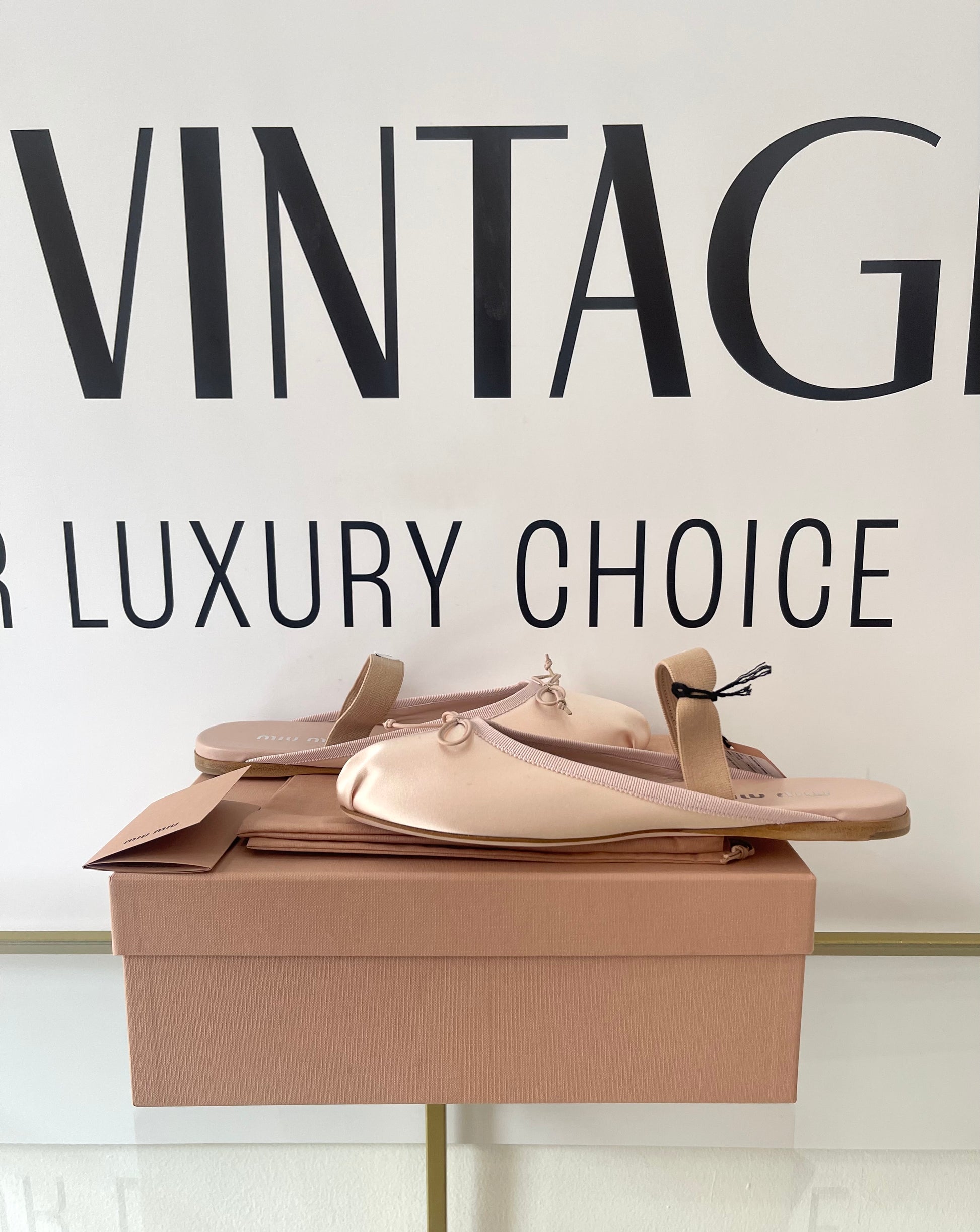 Ballerine in raso Miu Miu