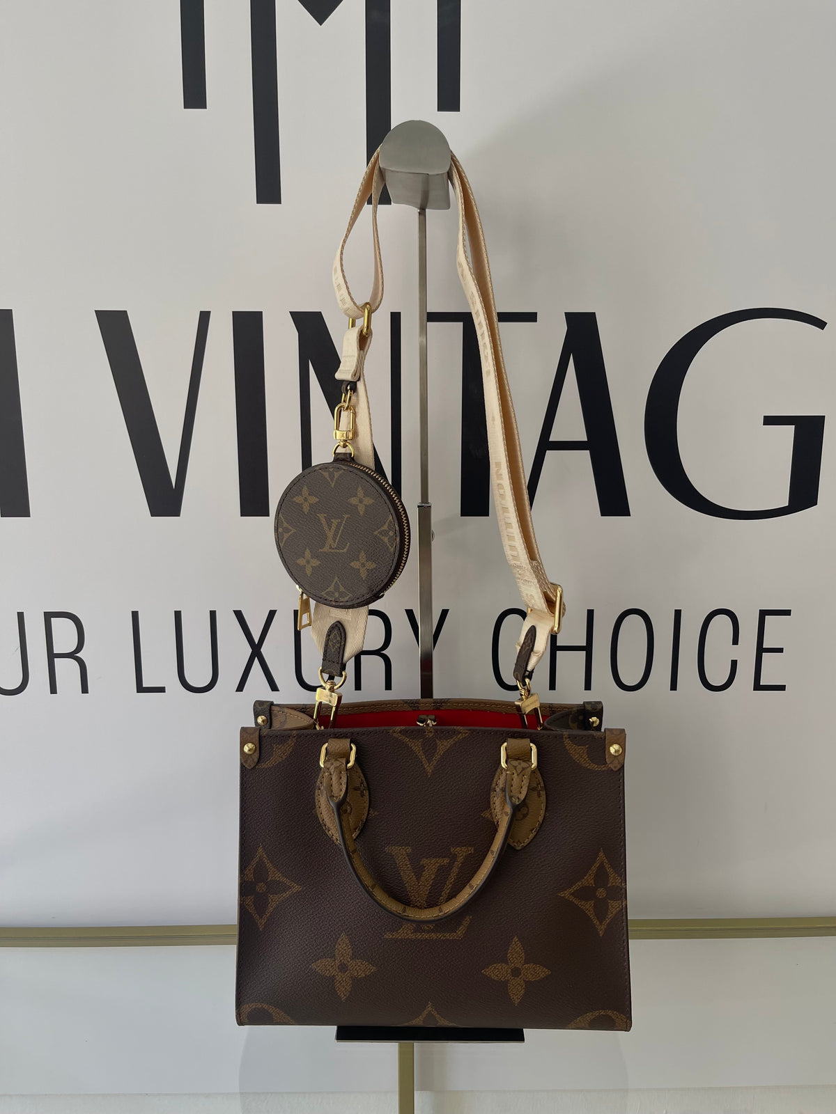 Borsa OnTheGo PM Monogram Reverse Giant Louis Vuitton