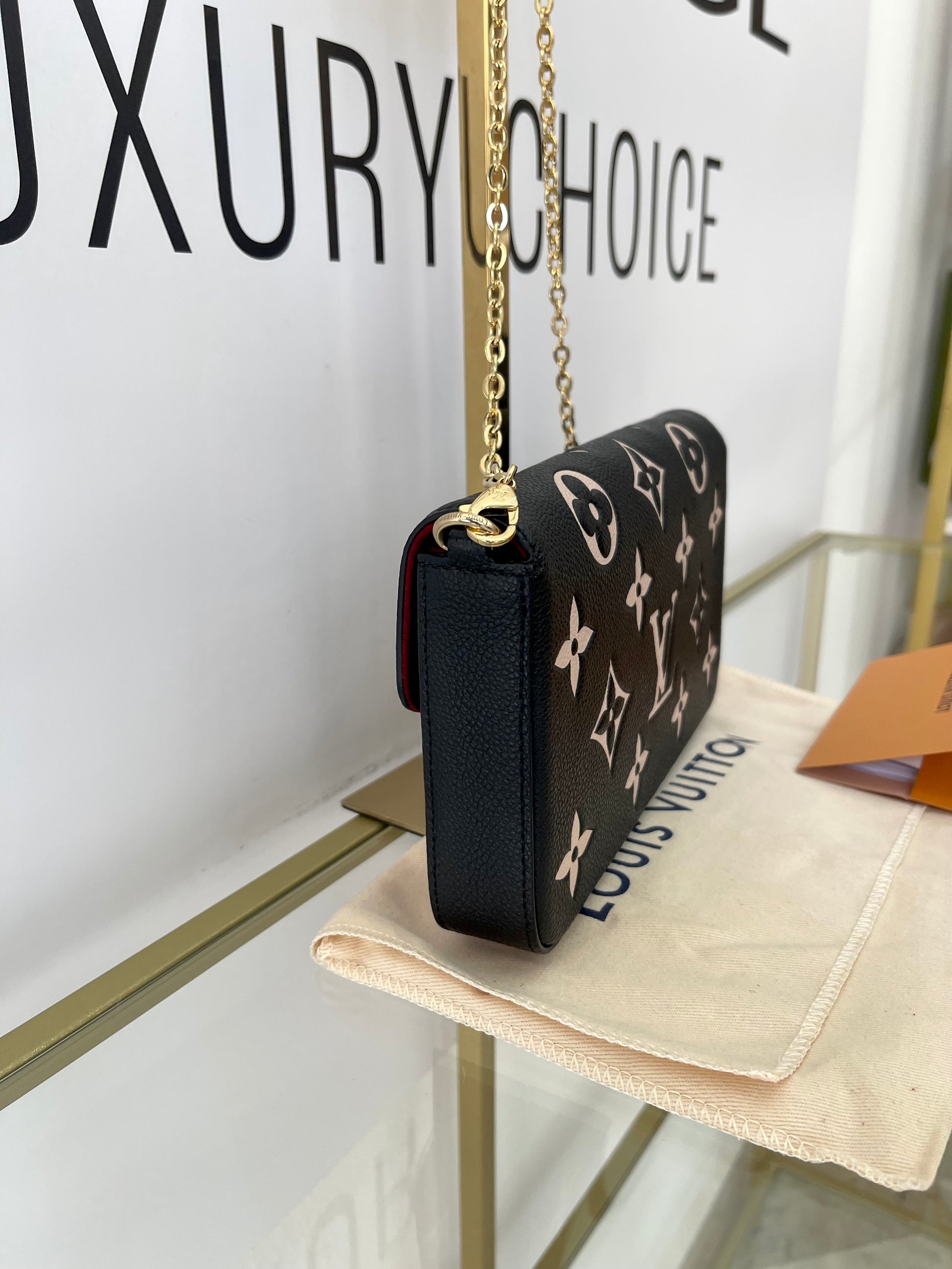 Pochette Félicie Monogram Empreinte Bicolor Louis Vuitton