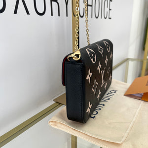 Pochette Félicie Monogram Empreinte Bicolor Louis Vuitton