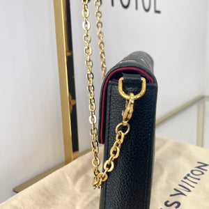 Pochette Felicie Monogram Empreinte bicolor Louis Vuitton