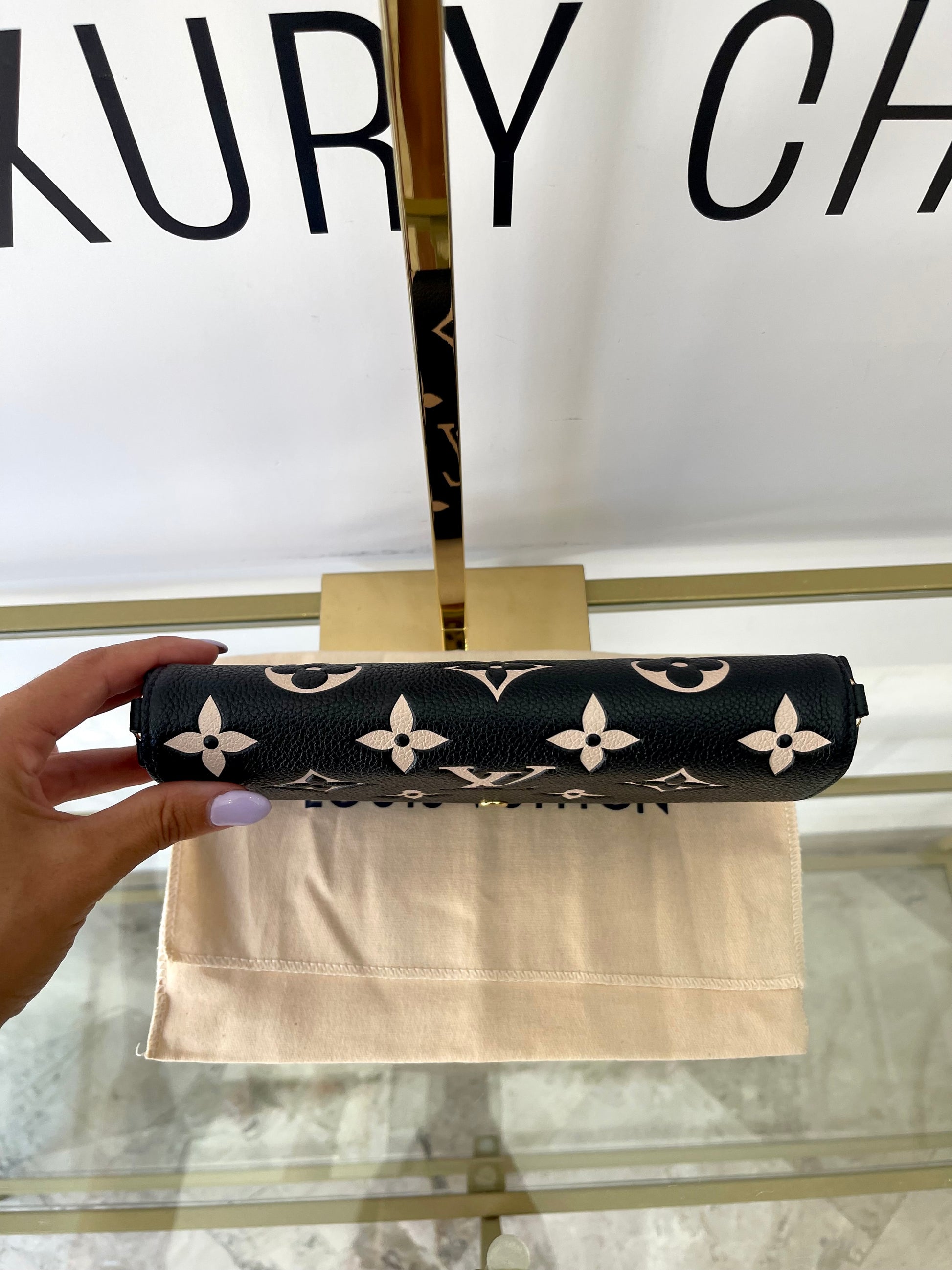 Pochette Félicie Monogram Empreinte Bicolor Louis Vuitton