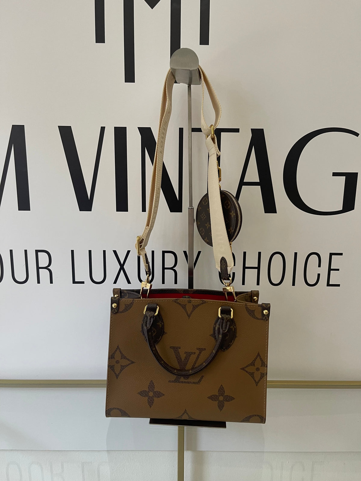 Borsa OnTheGo PM Monogram Reverse Giant Louis Vuitton