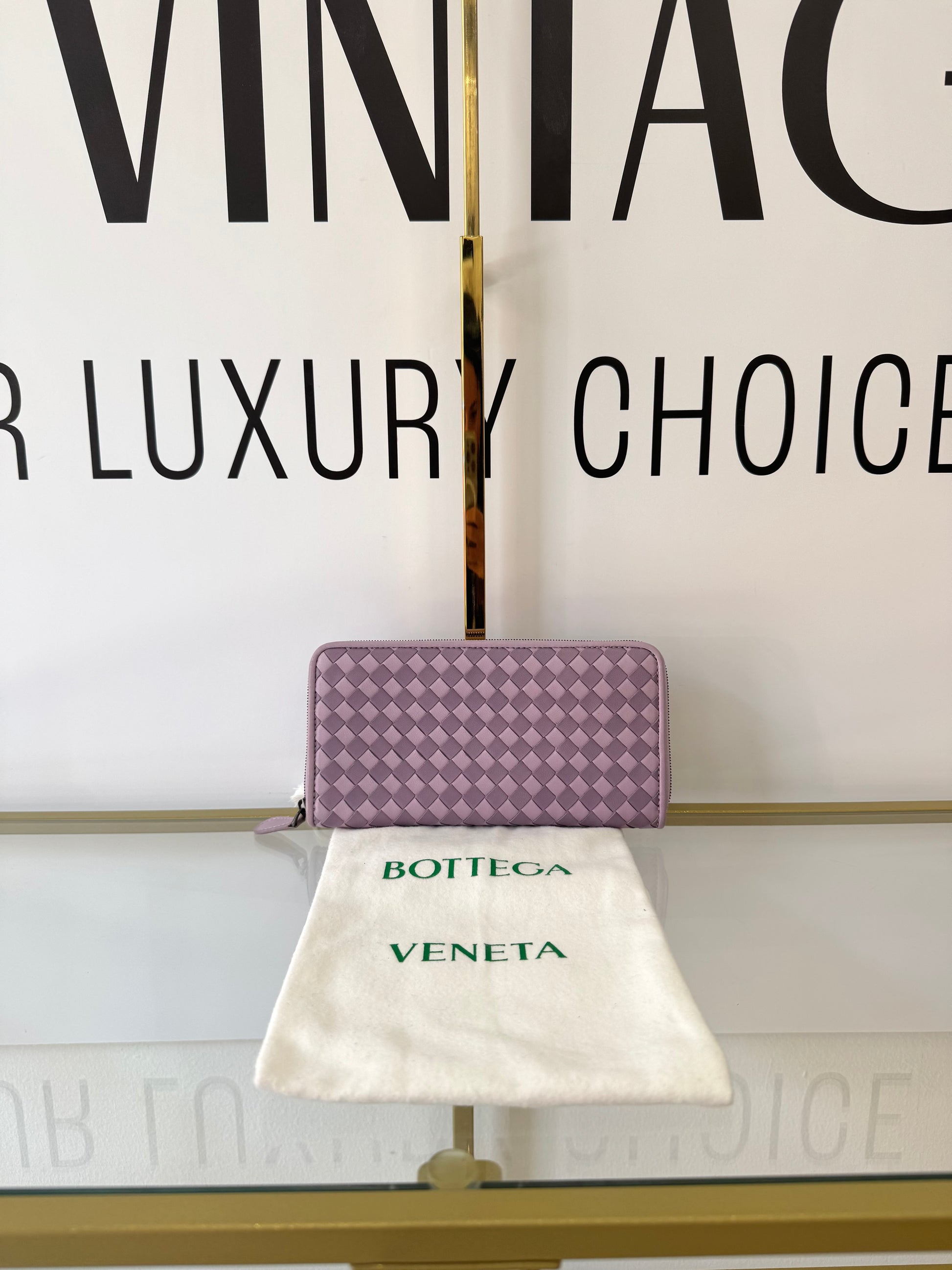 Portafoglio con zip viola Bottega Veneta