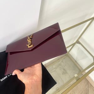 Pochette Uptown in pelle verniciata Saint Laurent