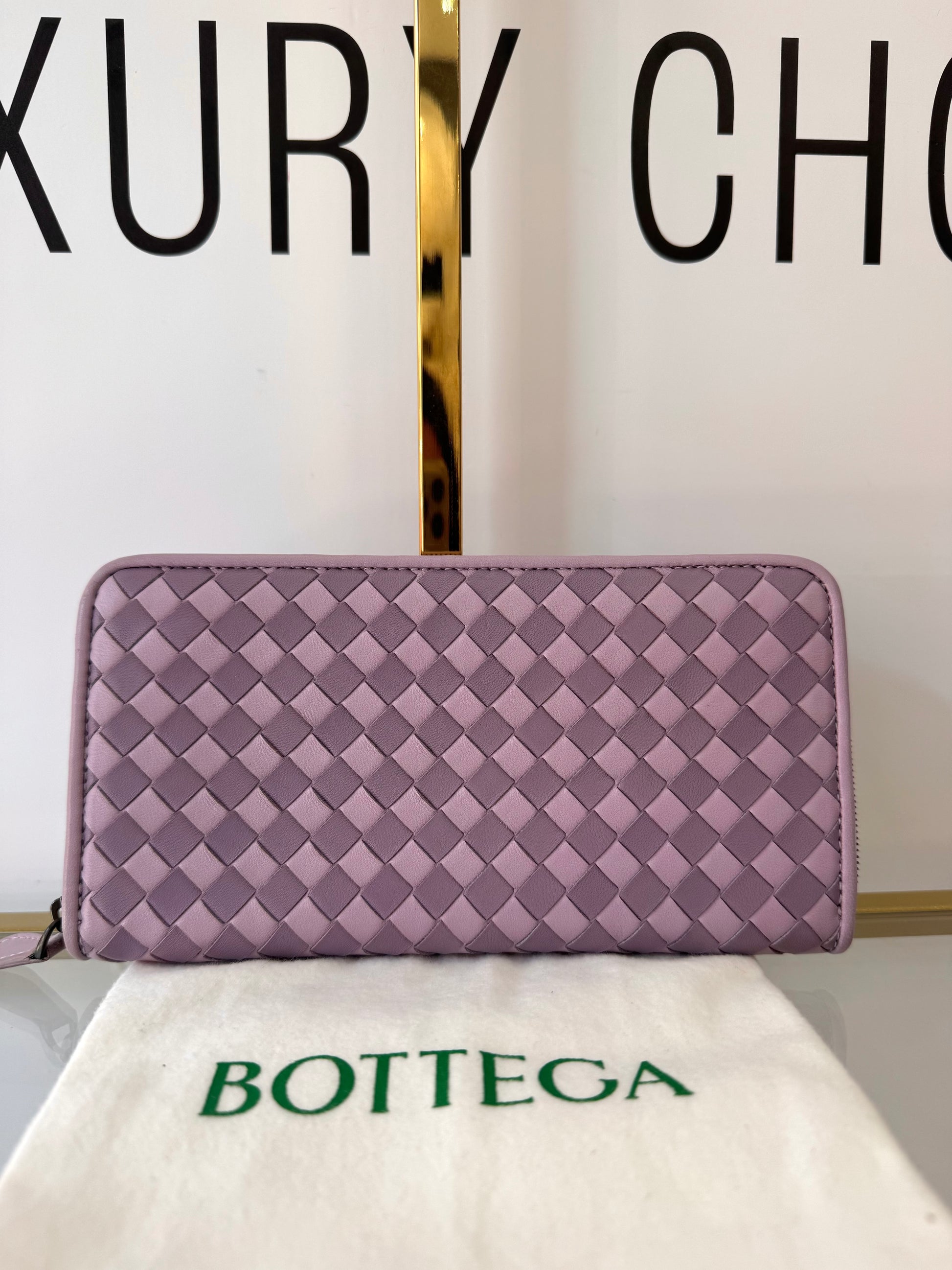 Portafoglio con zip viola Bottega Veneta