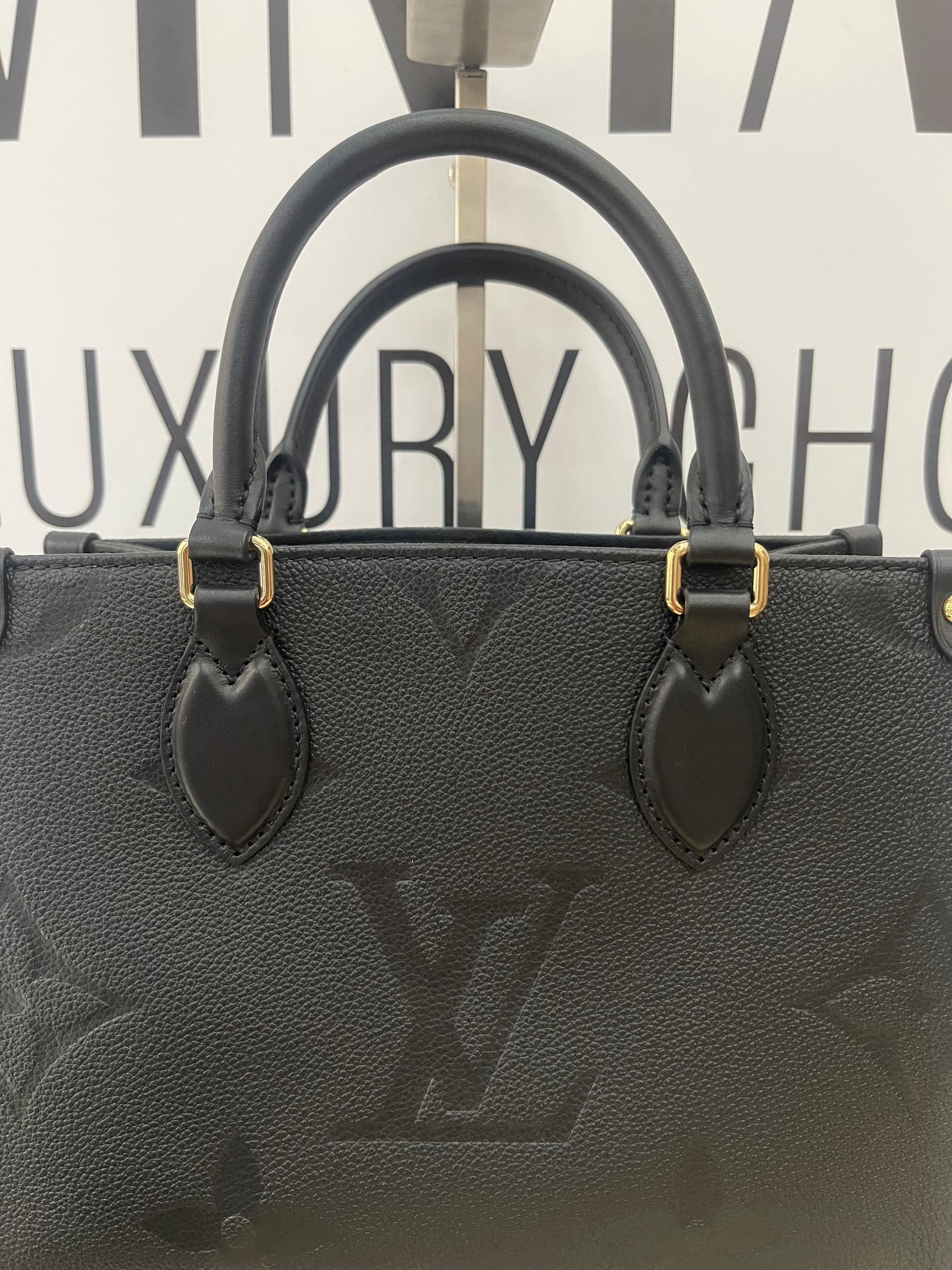 Borsa OnTheGo PM Monogram Empreinte Louis Vuitton
