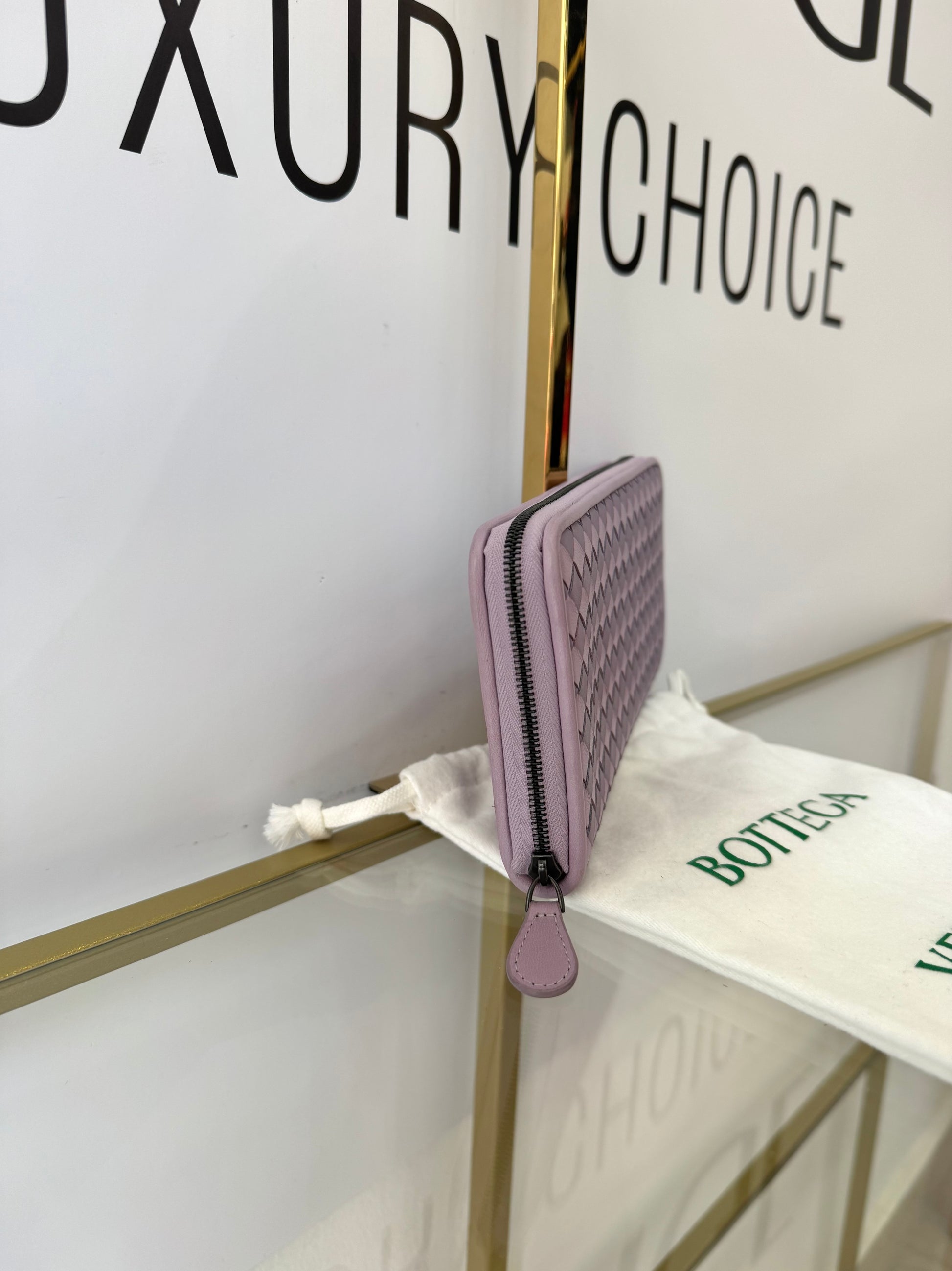 Portafoglio con zip viola Bottega Veneta