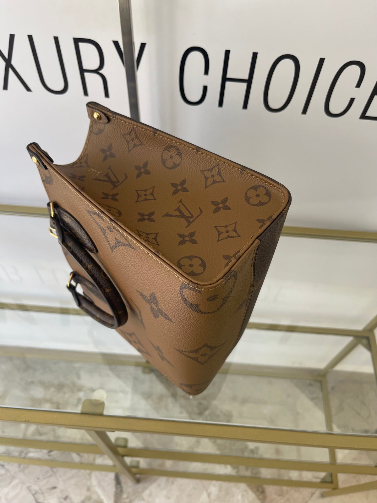 Borsa OnTheGo PM Monogram Reverse Giant Louis Vuitton