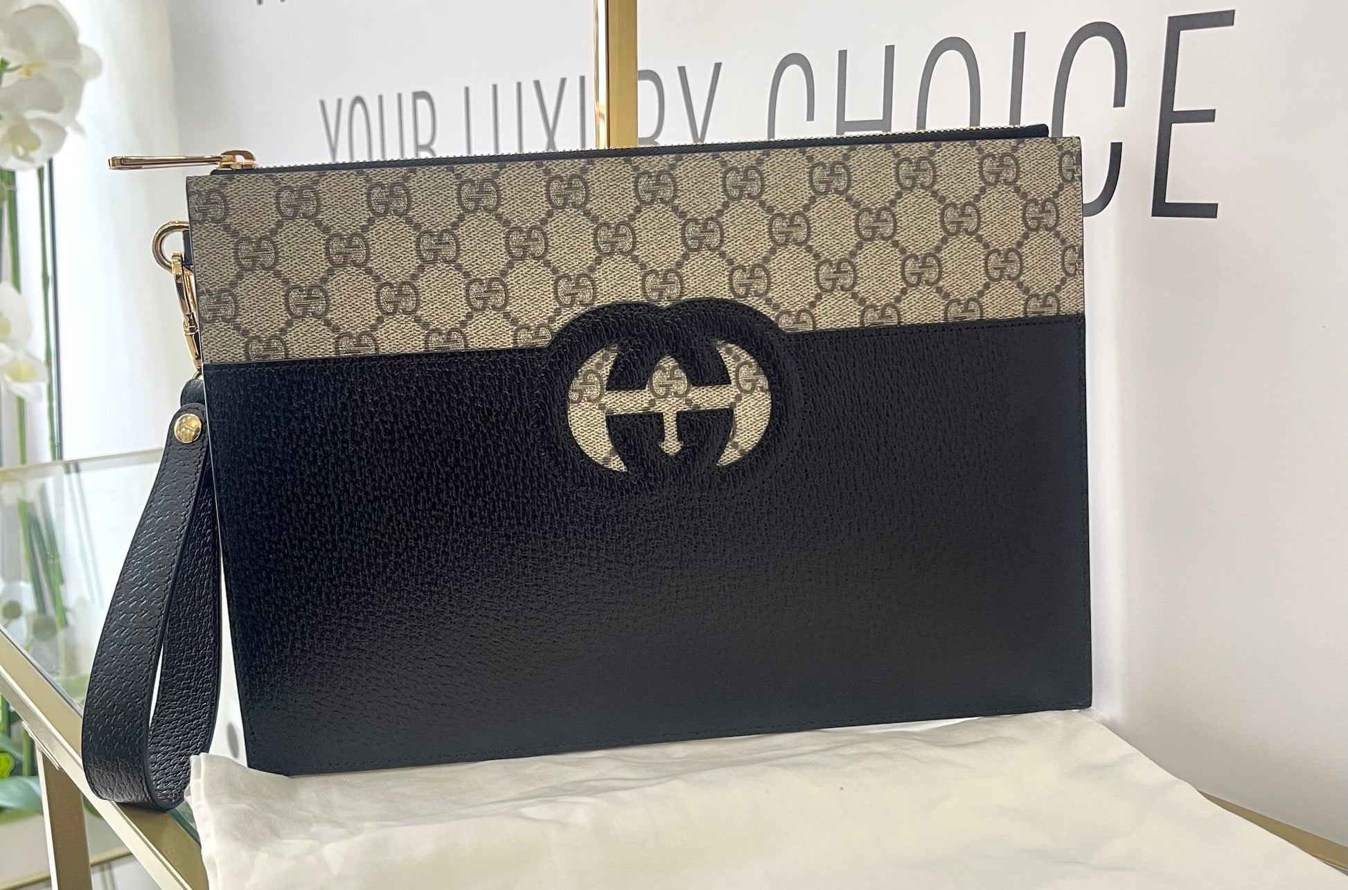 Pochette Interlocking GG Supreme Gucci