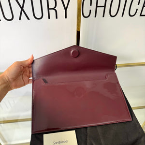 Pochette Uptown in pelle verniciata Saint Laurent