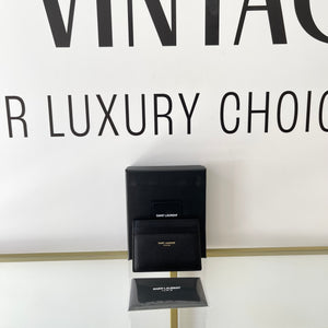 Portacarte con logo oro in pelle martellata YSL