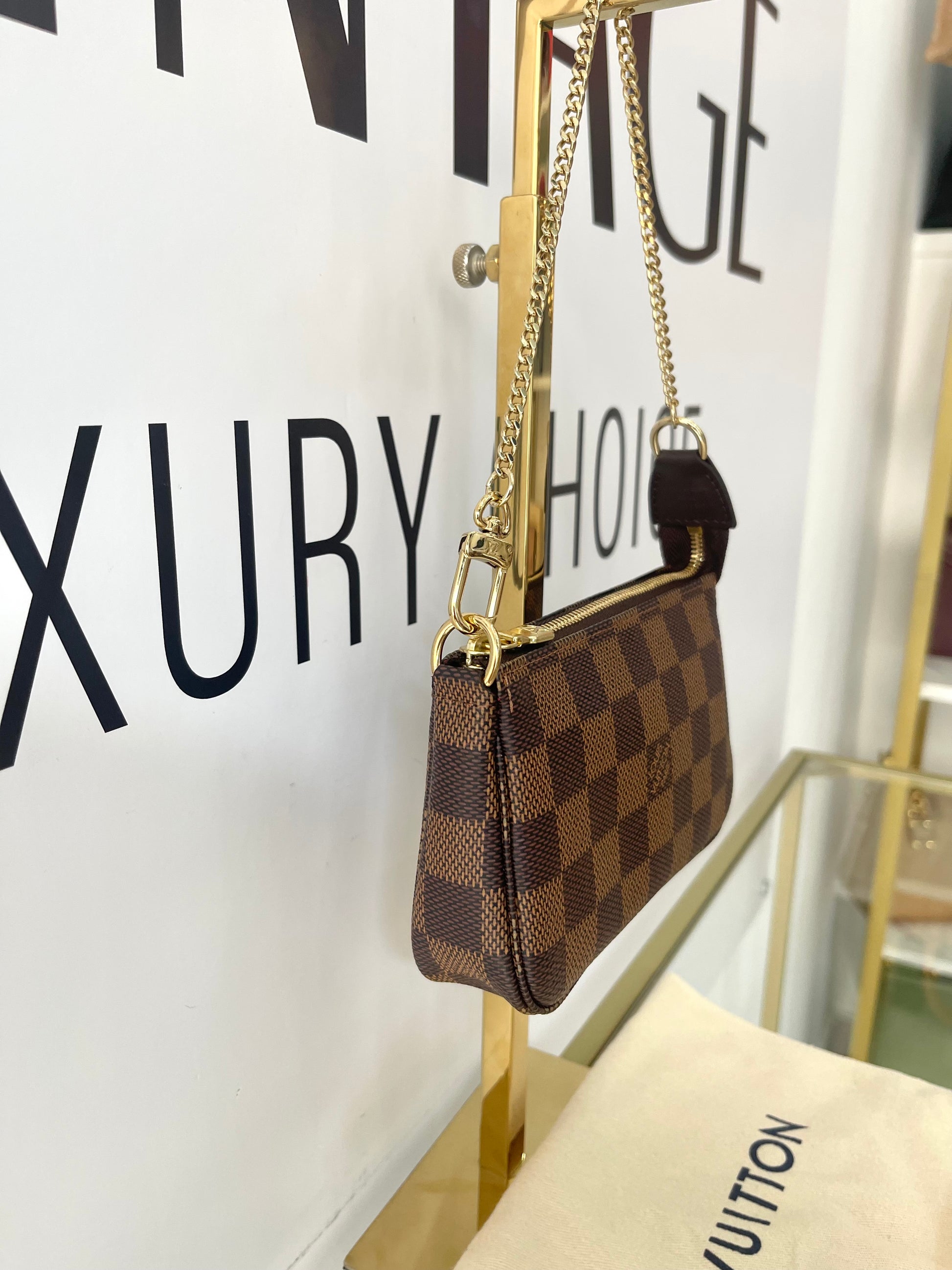 Borsa Mini Pochette Accessoires Damier Ebène Louis Vuitton