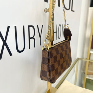 Borsa Mini Pochette Accessoires Damier Ebène Louis Vuitton