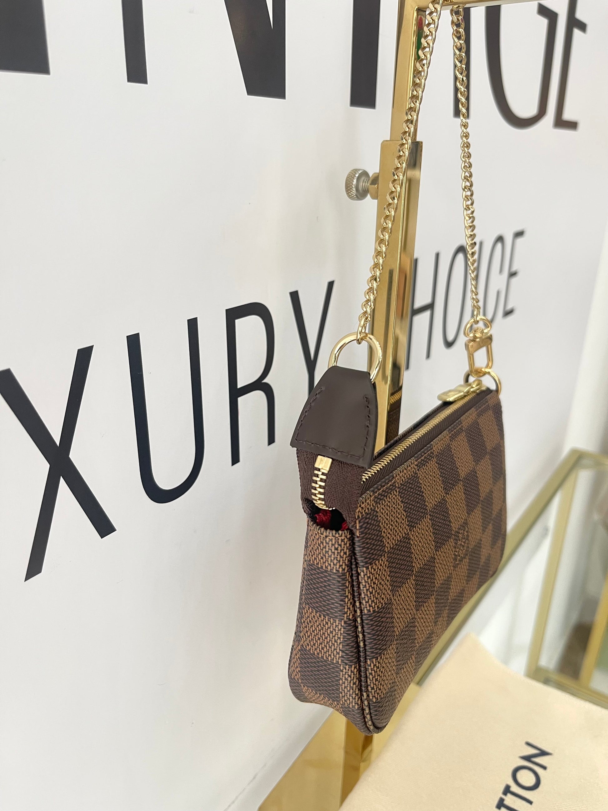 Borsa Mini Pochette Accessoires Damier Ebène Louis Vuitton