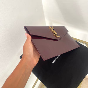 Pochette Uptown in pelle verniciata Saint Laurent