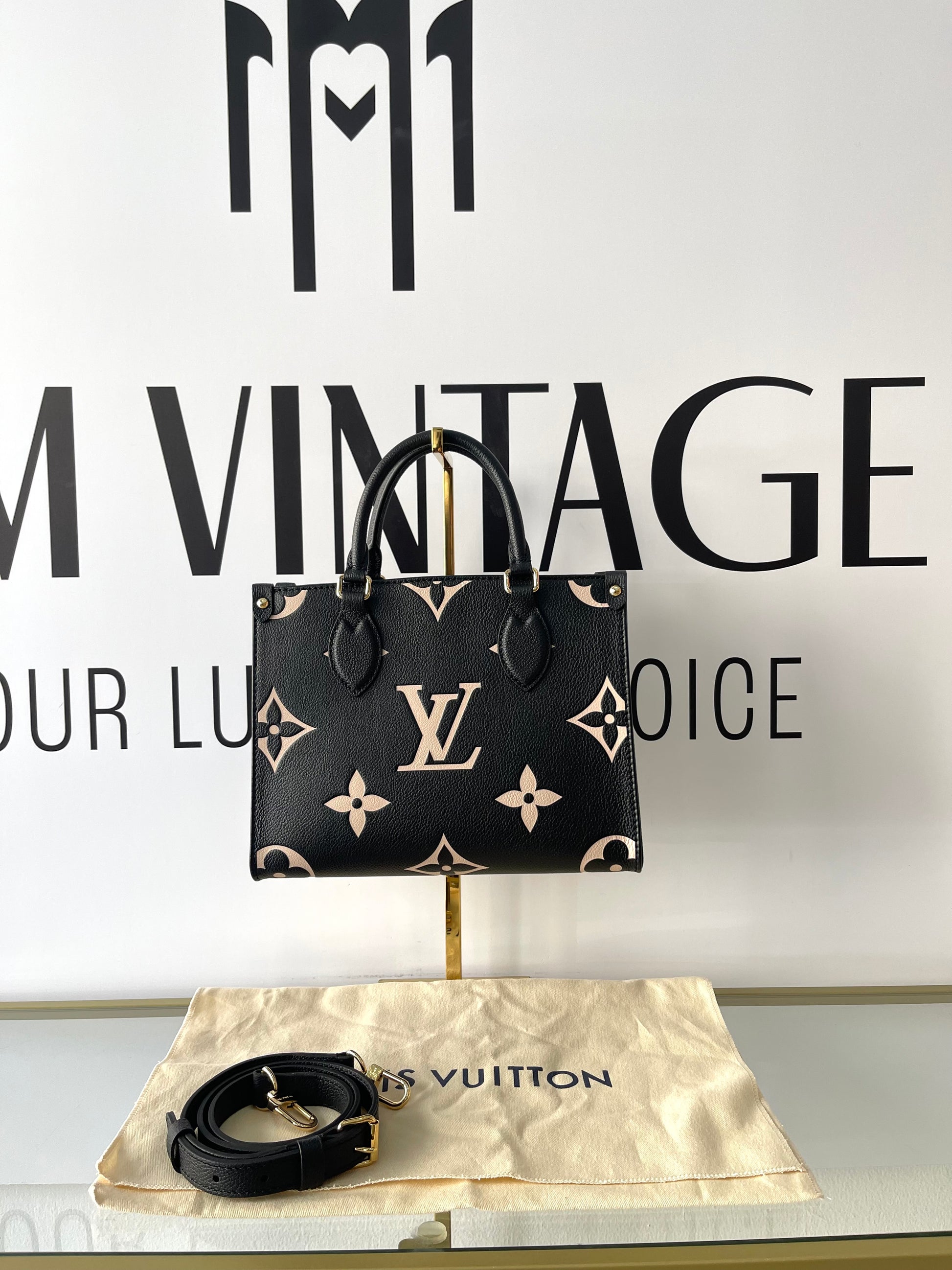 Borsa OnTheGo PM Monogram Empreinte Bicolor Louis Vuitton
