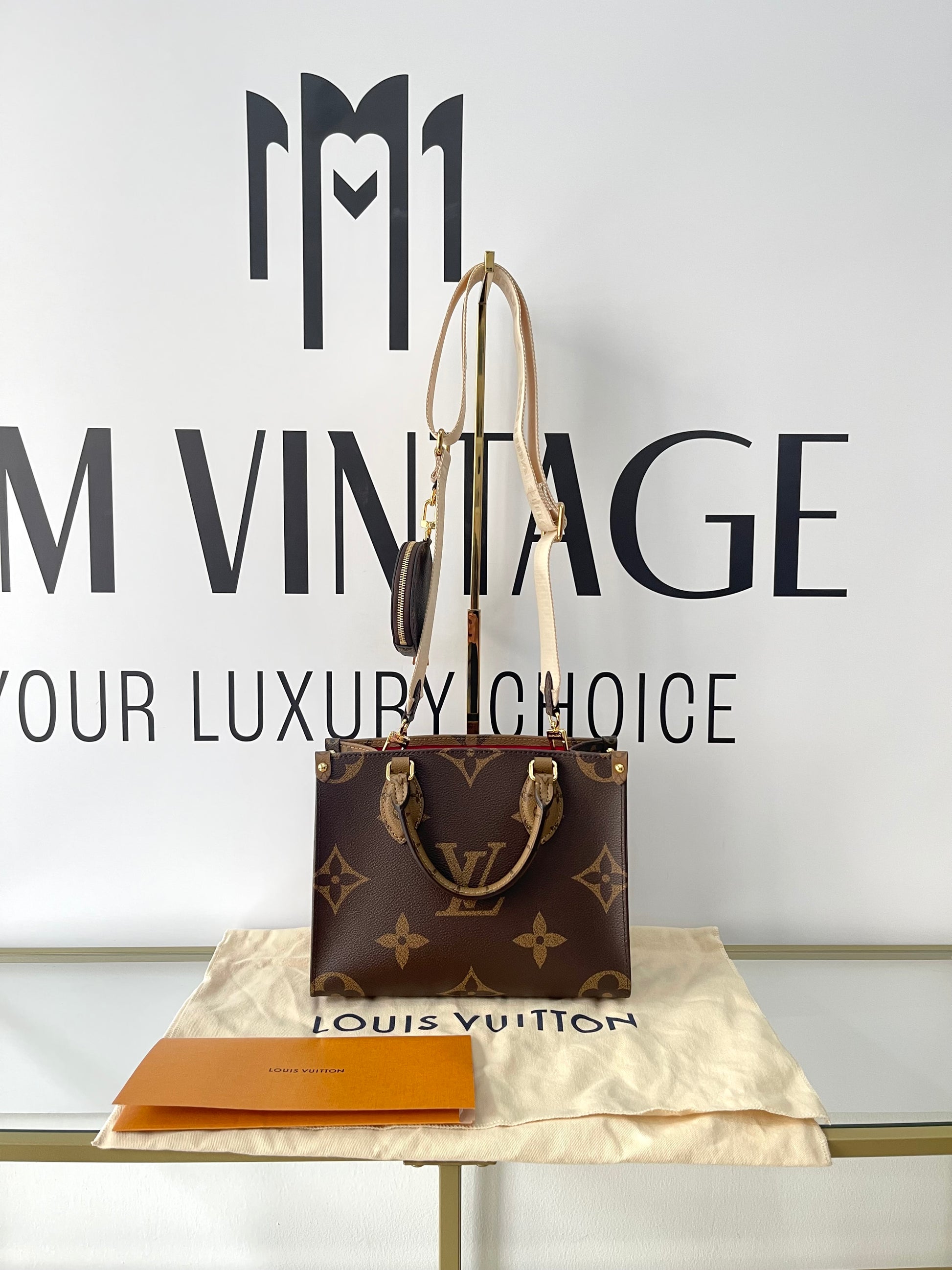 Borsa OnTheGo PM Monogram Reverse Giant Louis Vuitton