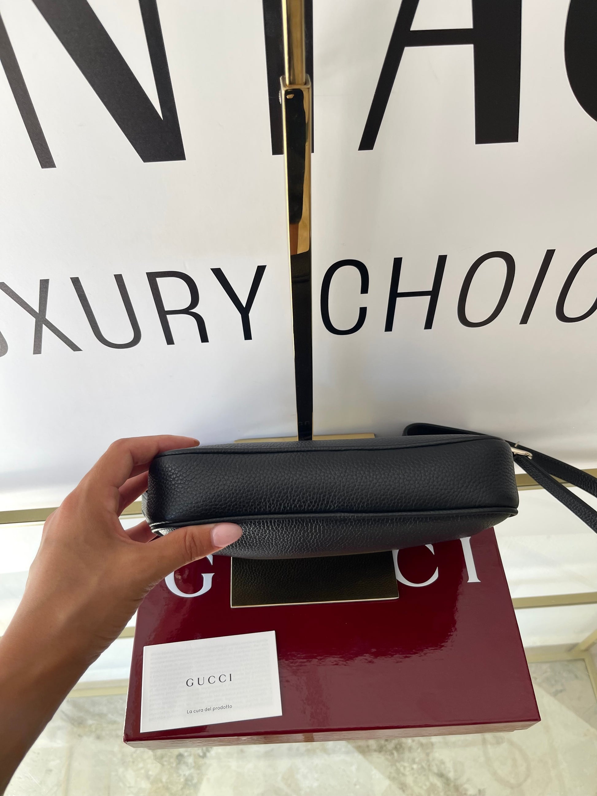 Borsa in pelle martellata Gucci
