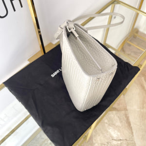 Borsa Cassandra in pelle goffrata coccodrillo YSL