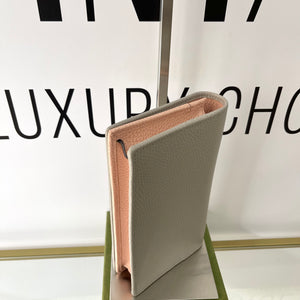 Pochette GG Marmont con catena Gucci