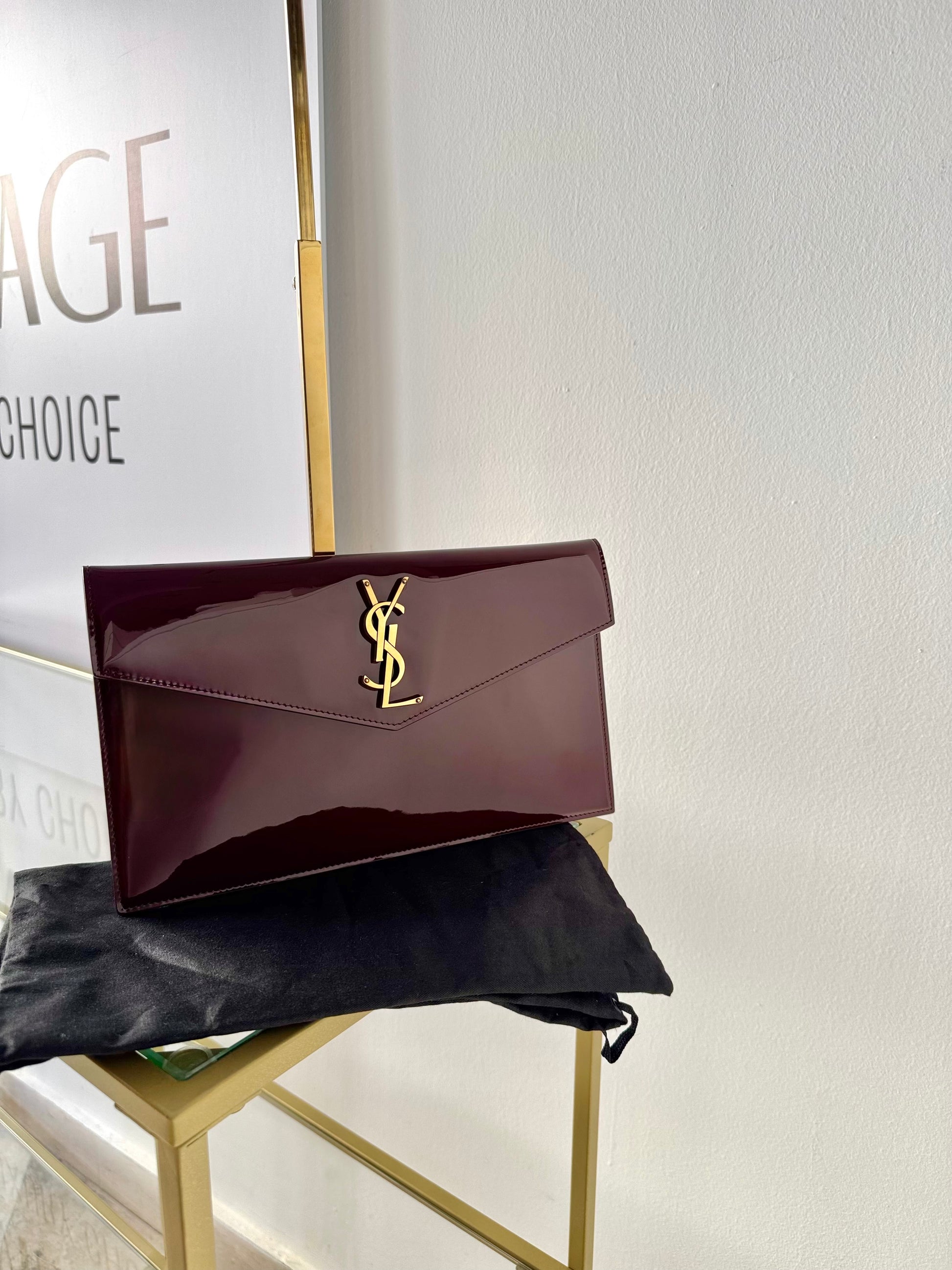 Pochette Uptown in pelle verniciata Saint Laurent