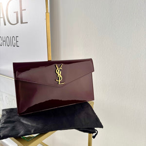 Pochette Uptown in pelle verniciata Saint Laurent
