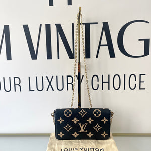 Pochette Felicie Monogram Empreinte bicolor Louis Vuitton