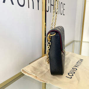 Pochette Felicie Monogram Empreinte bicolor Louis Vuitton