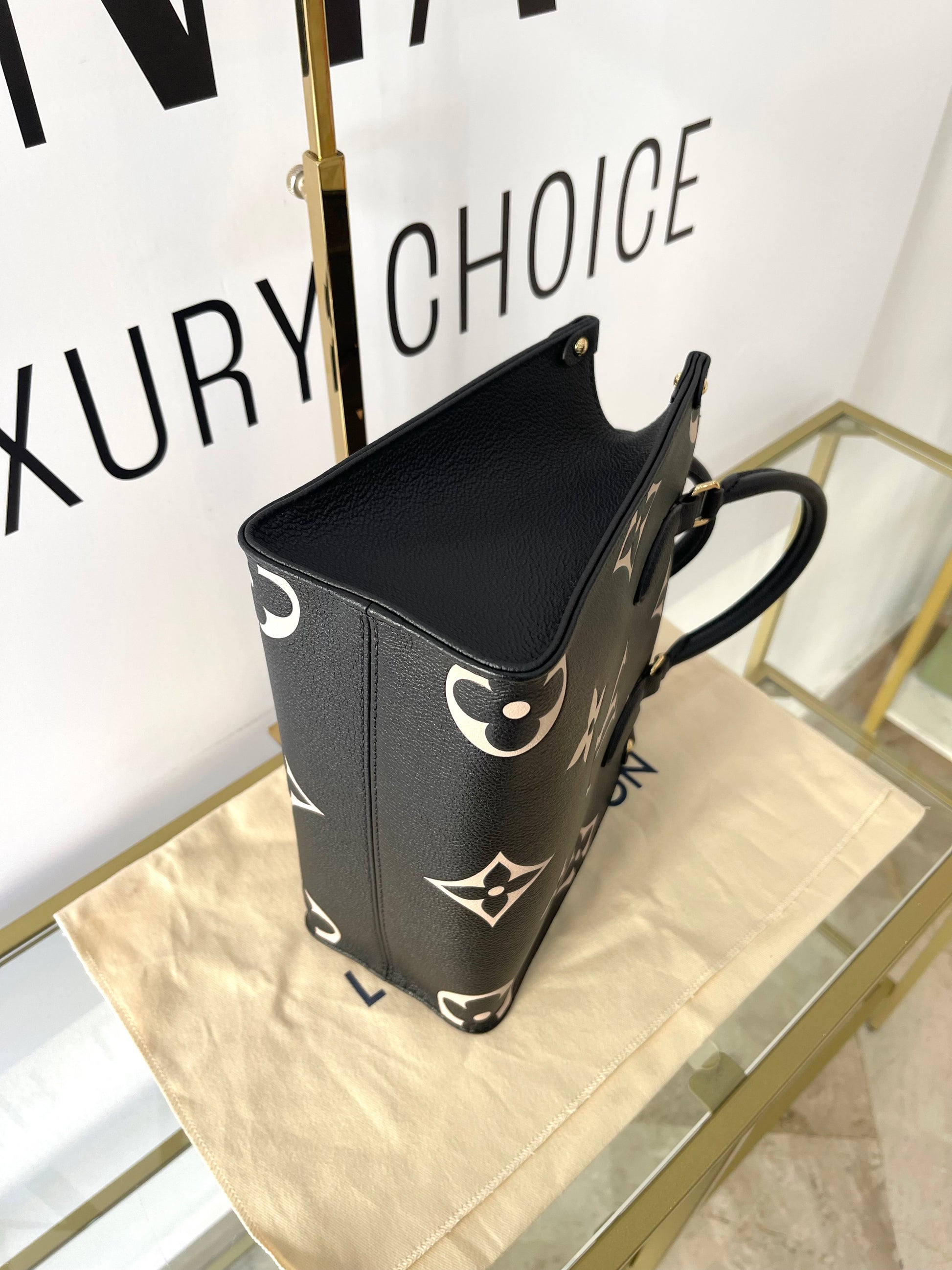 Borsa OnTheGo PM Monogram Empreinte Bicolor Louis Vuitton