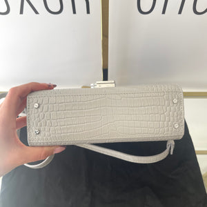 Borsa Cassandra in pelle goffrata coccodrillo YSL