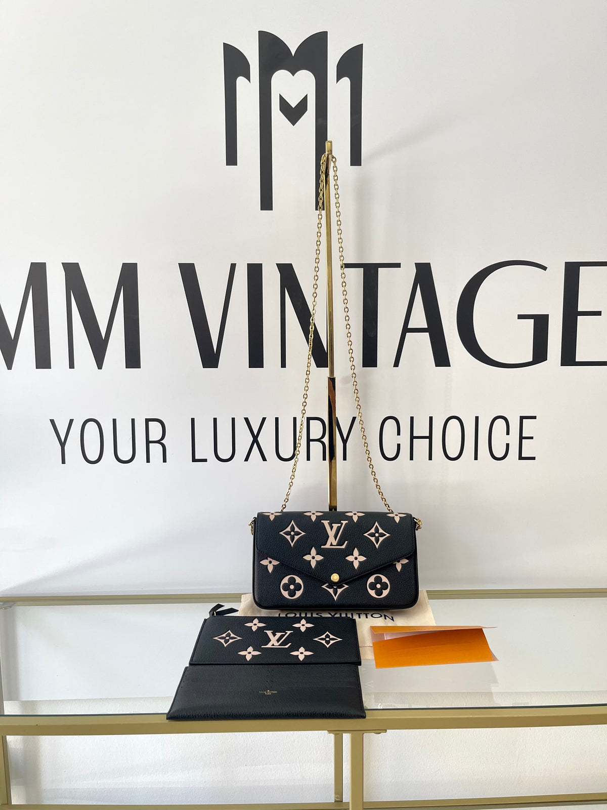 Pochette Félicie Monogram Empreinte Bicolor Louis Vuitton