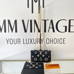 Pochette Félicie Monogram Empreinte Bicolor Louis Vuitton