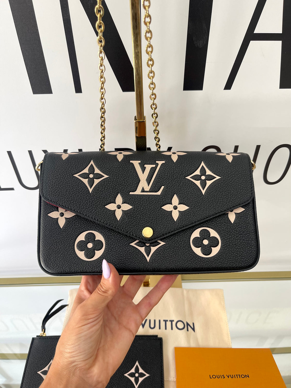 Pochette Félicie Monogram Empreinte Bicolor Louis Vuitton