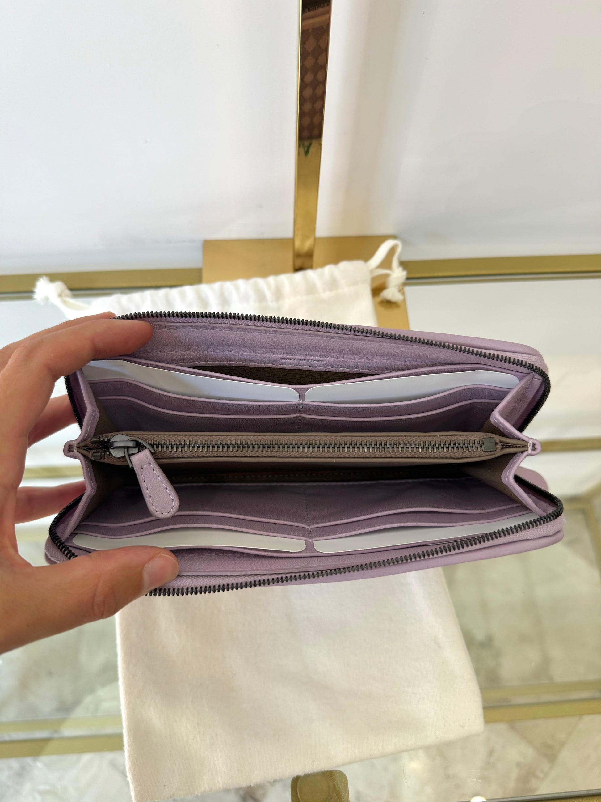 Portafoglio con zip viola Bottega Veneta