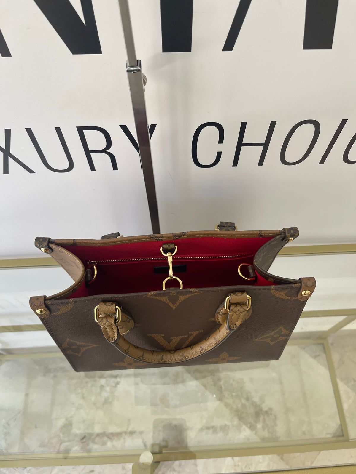 Borsa OnTheGo PM Monogram Reverse Giant Louis Vuitton