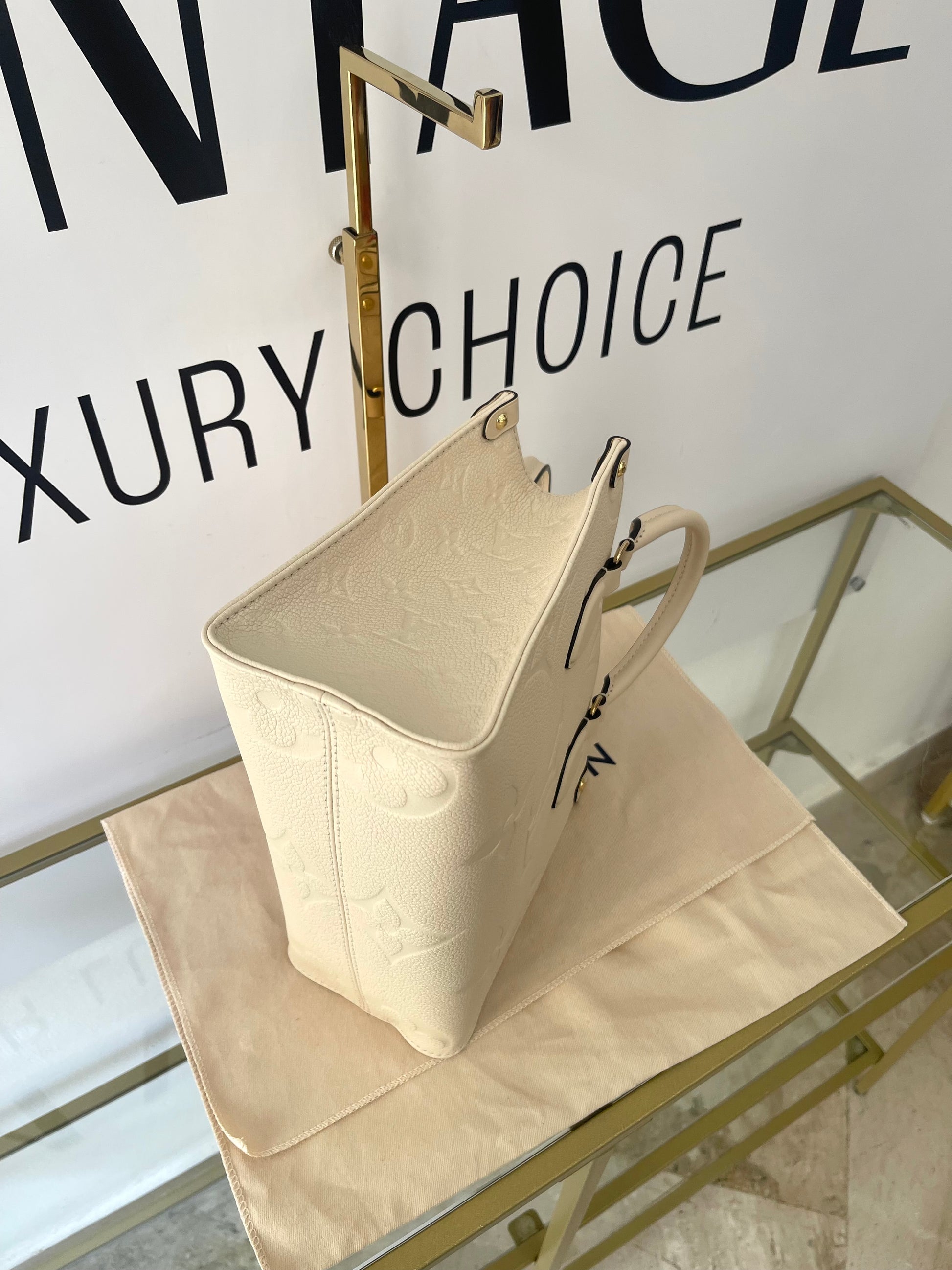 Borsa OnTheGo PM Monogram Empreinte Louis Vuitton