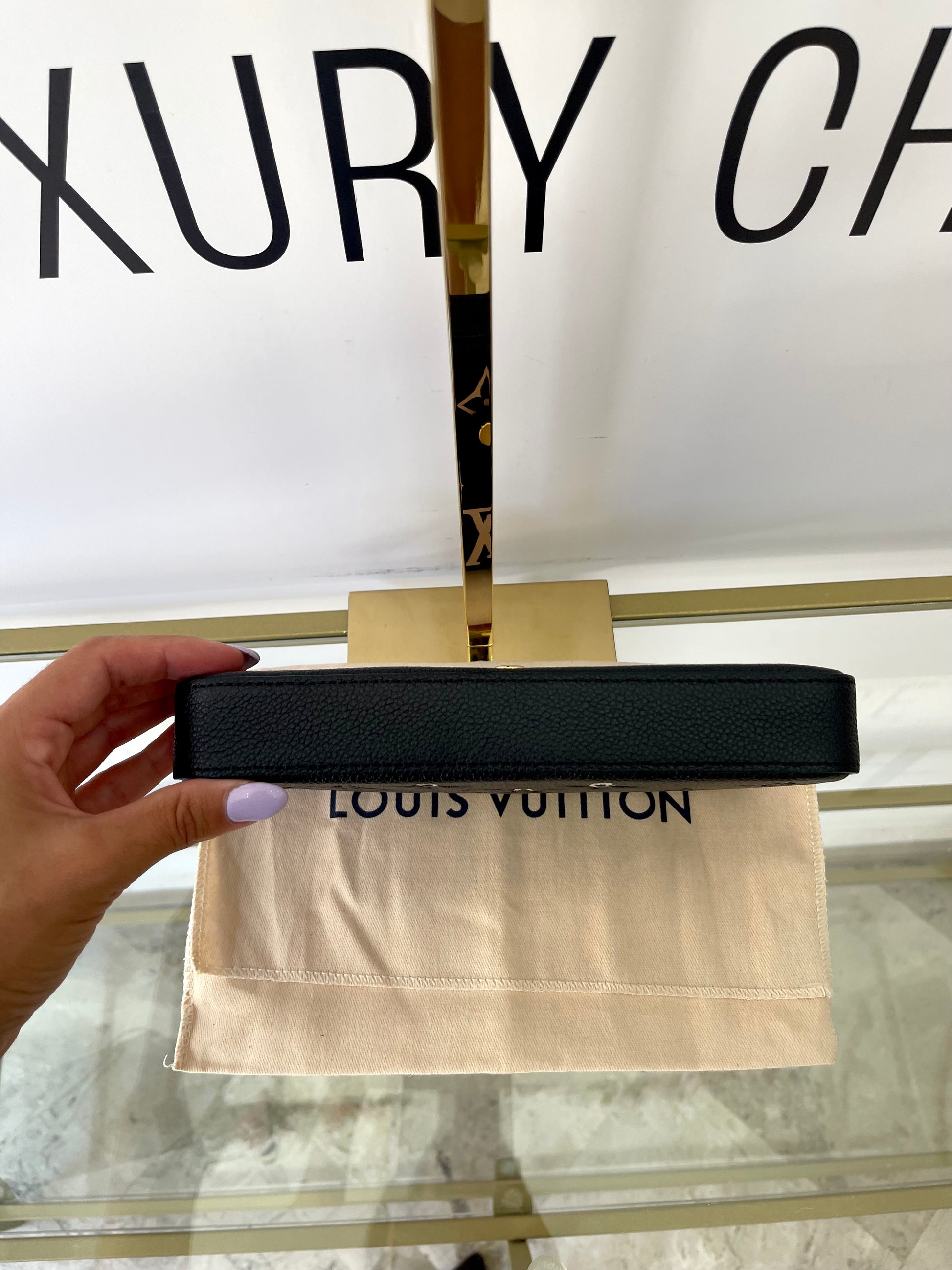 Pochette Félicie Monogram Empreinte Bicolor Louis Vuitton
