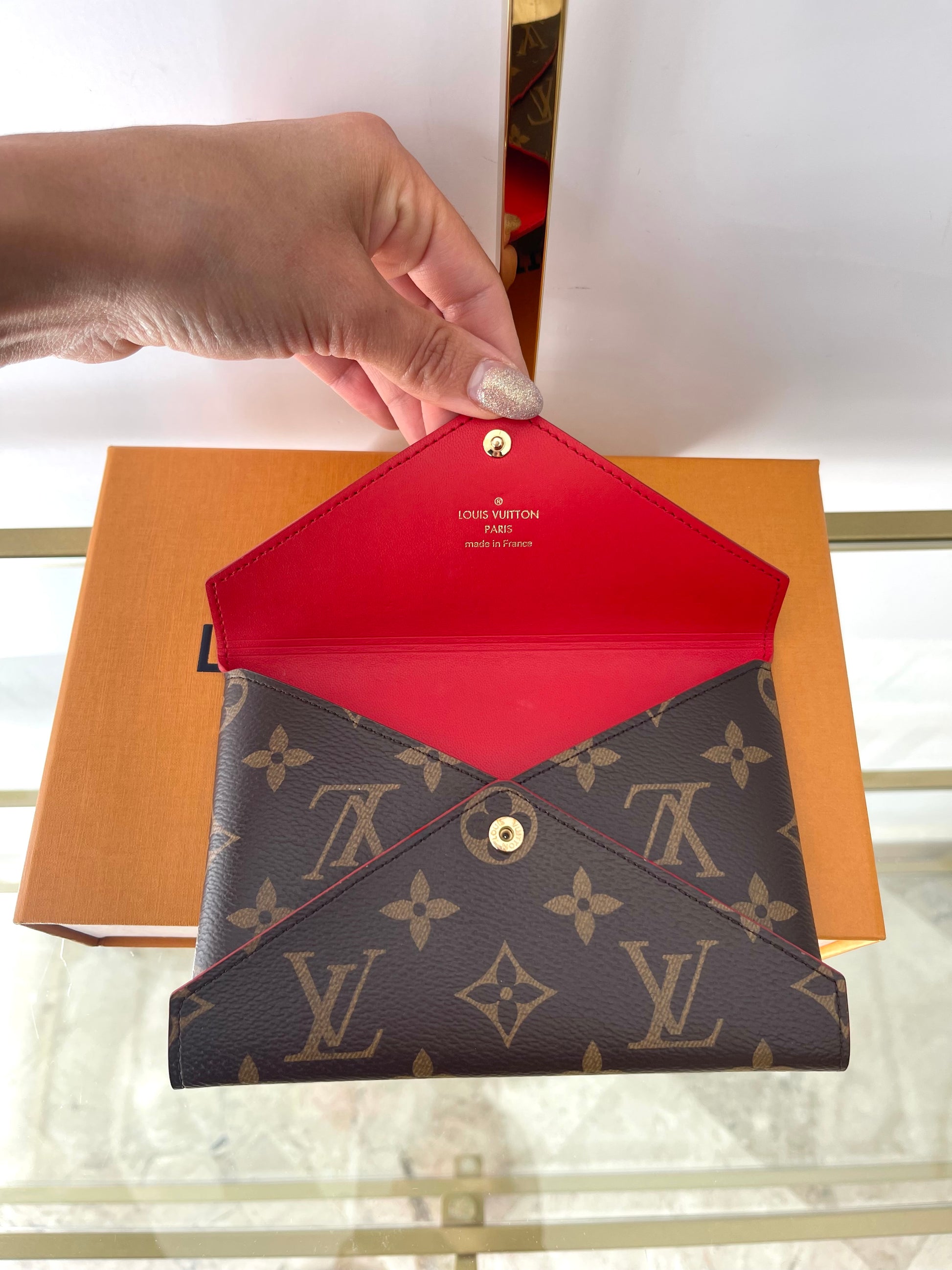 Pochette Kirigami Monogram Medium Louis Vuitton
