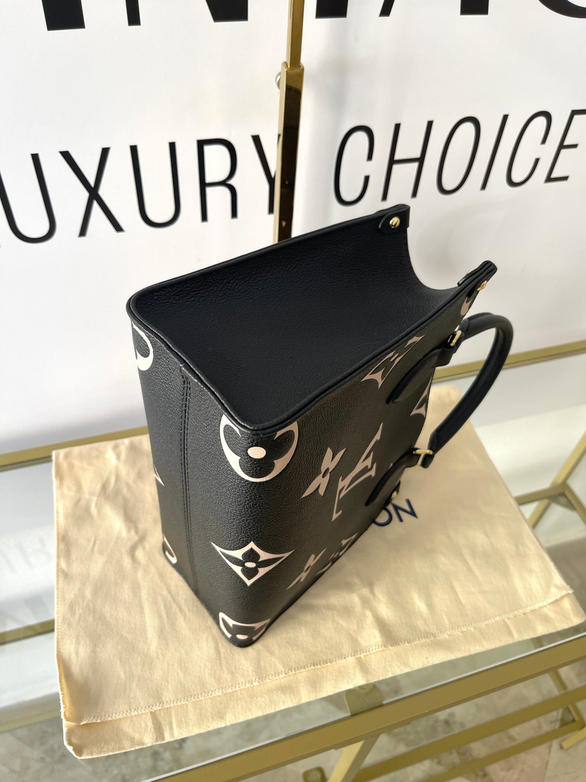 Borsa OnTheGo PM Monogram Empreinte Bicolor Louis Vuitton