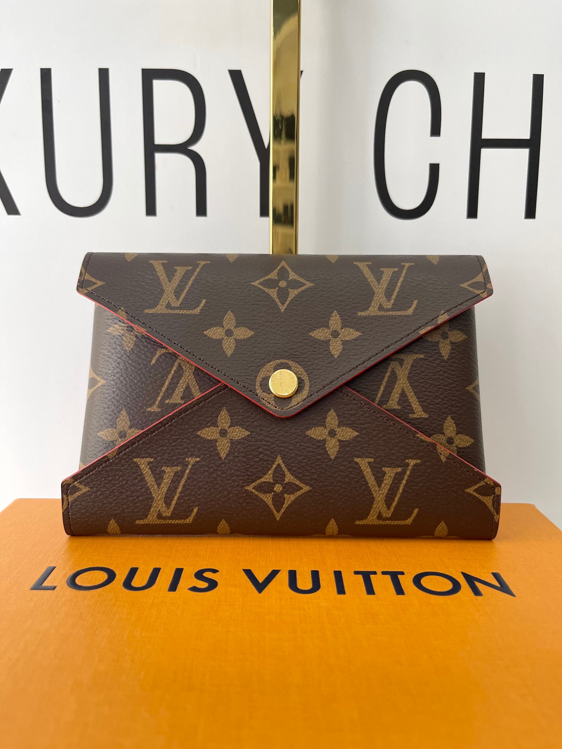 Pochette Kirigami Monogram Medium Louis Vuitton