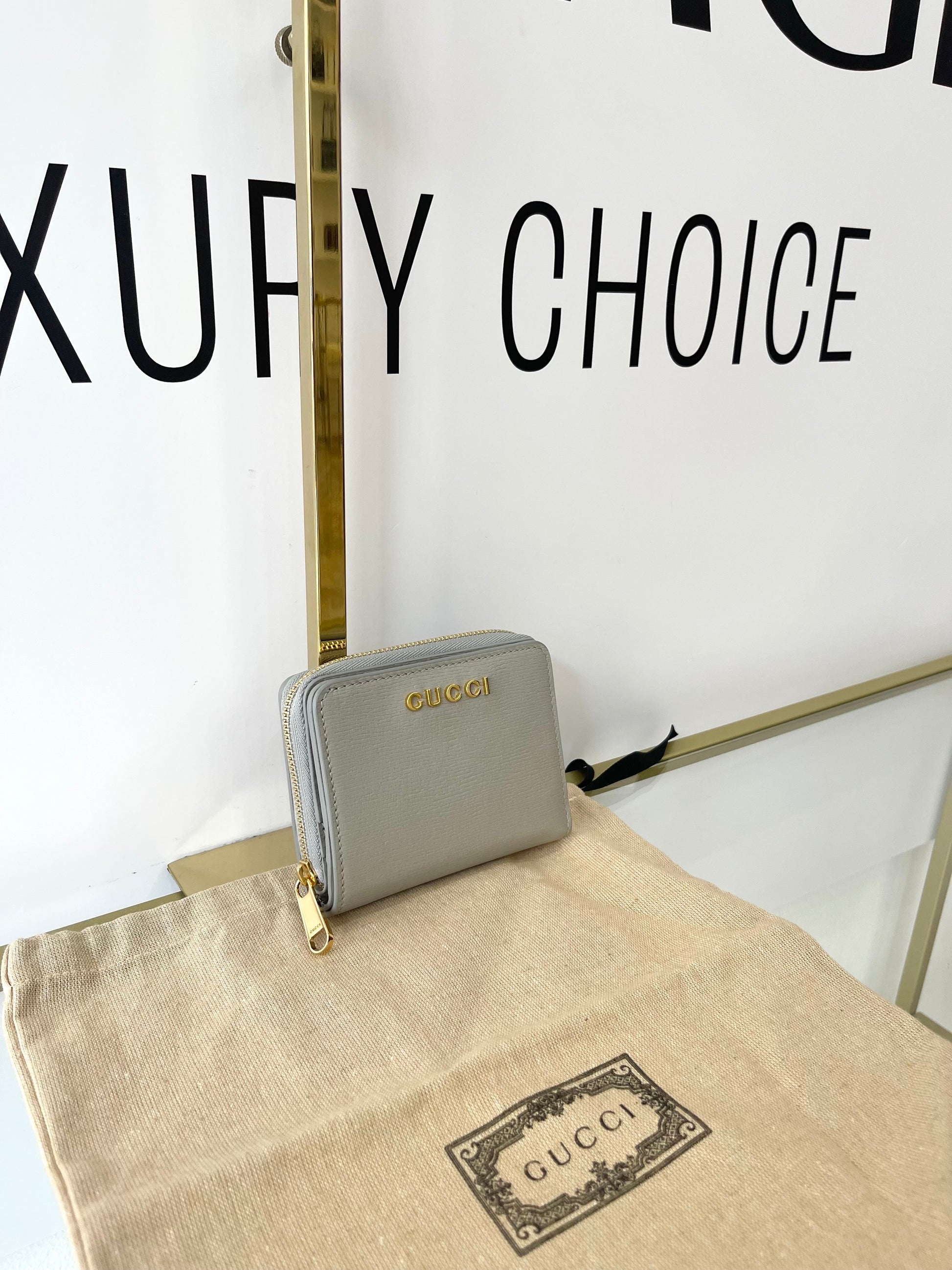 Portafoglio con logo Gucci grigio chiaro