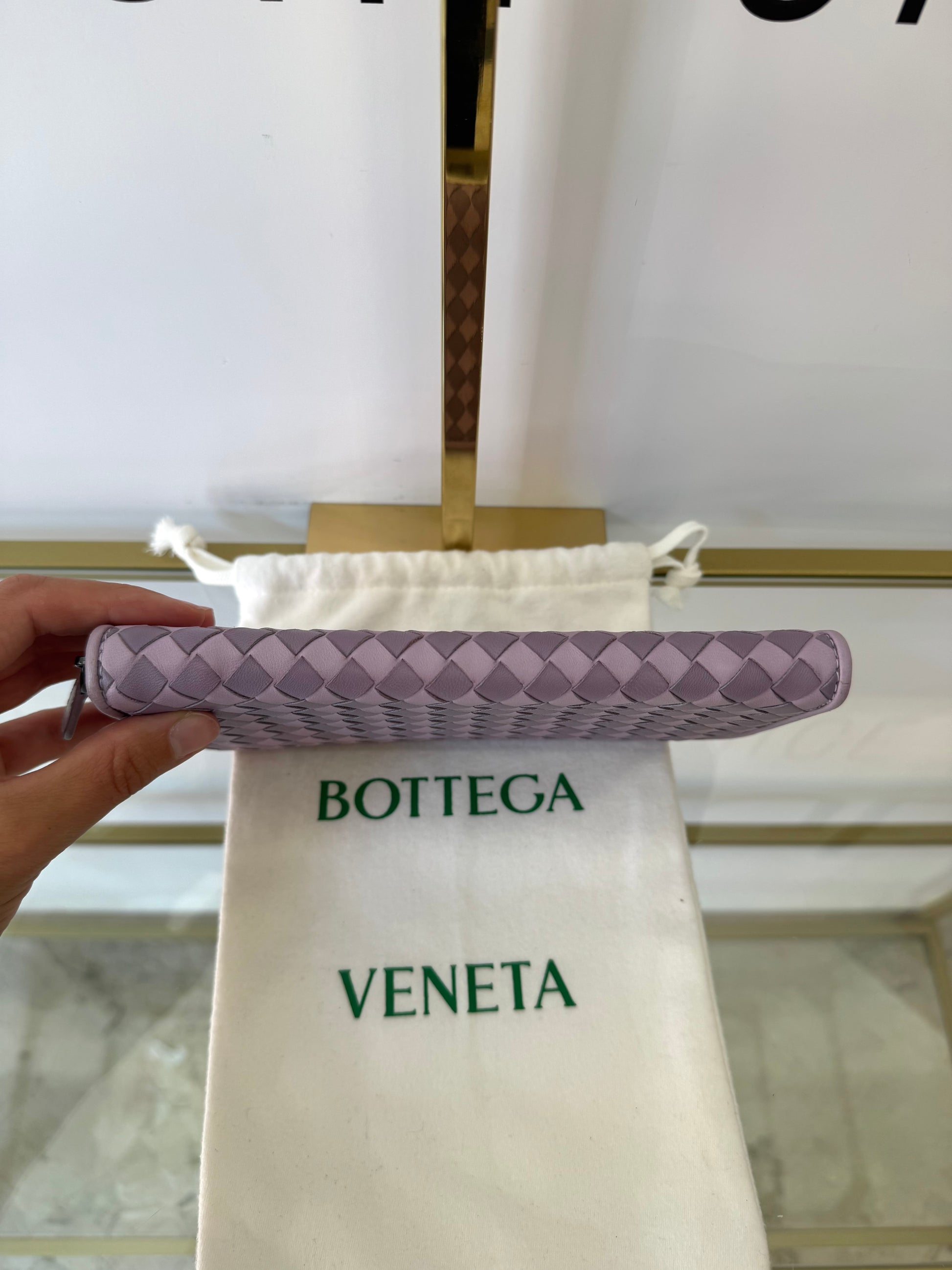 Portafoglio con zip viola Bottega Veneta