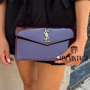 Pochette Uptown in pelle verniciata Saint Laurent