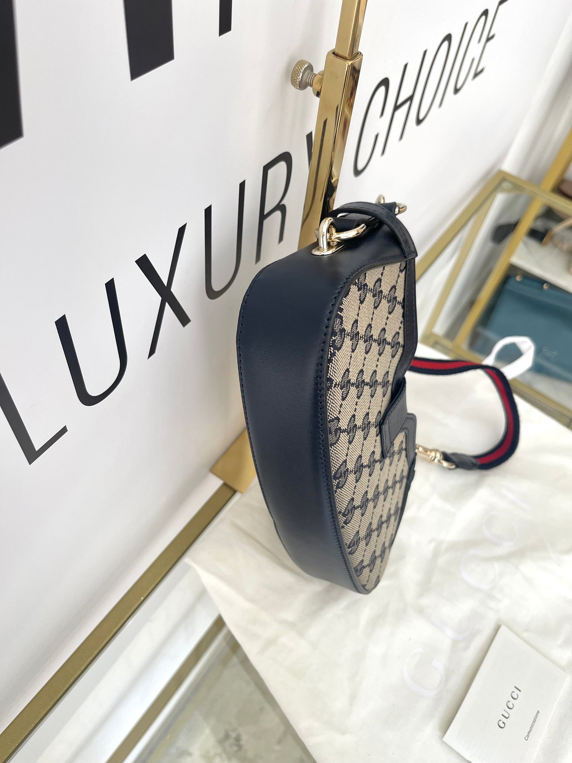 Borsa Moon Side GG Supreme Gucci