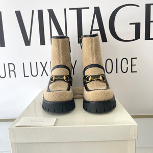 Stivaletti con dettaglio Ape e morsetto Gucci