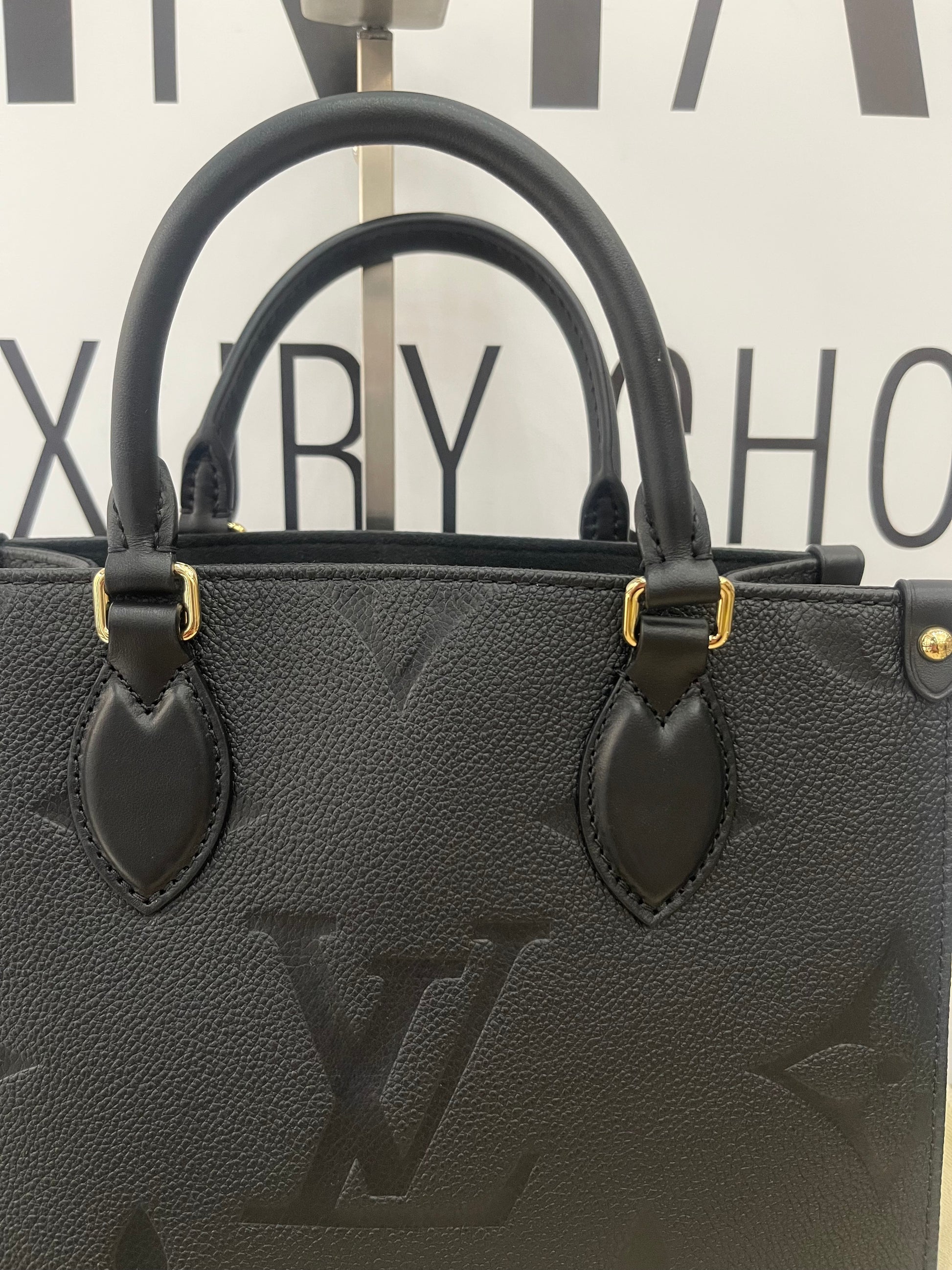 Borsa OnTheGo PM Monogram Empreinte Louis Vuitton