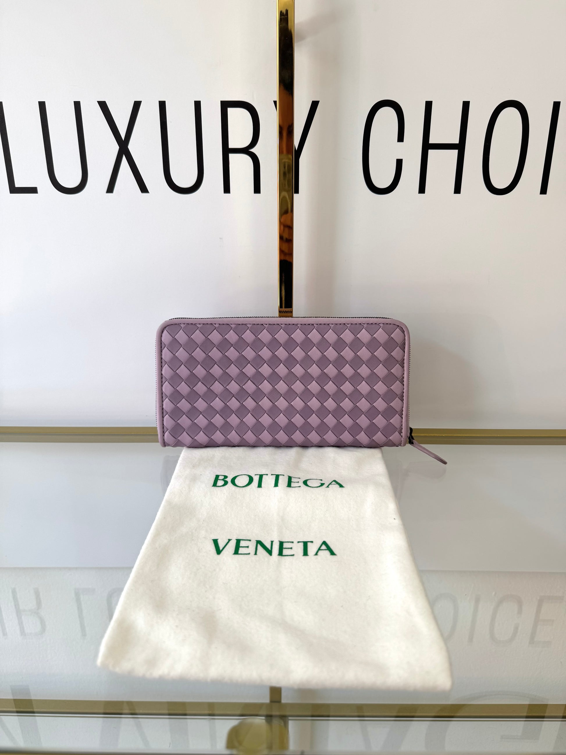Portafoglio con zip viola Bottega Veneta