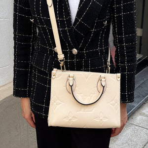 Borsa OnTheGo PM Monogram Empreinte Louis Vuitton